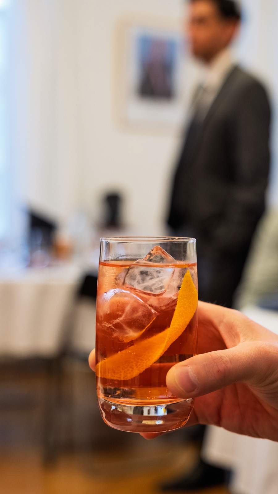 A pisco cocktail in hand